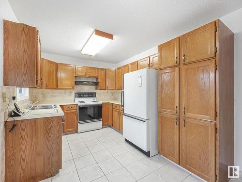 7223 152B Avenue, Edmonton, AB - Indoor Photo Showing Kitchen With Double Sink