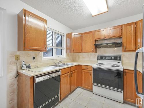 7223 152B Avenue, Edmonton, AB - Indoor Photo Showing Kitchen With Double Sink