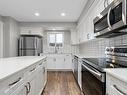 206 Allard Way, Fort Saskatchewan, AB  - Indoor Photo Showing Kitchen With Stainless Steel Kitchen With Upgraded Kitchen 