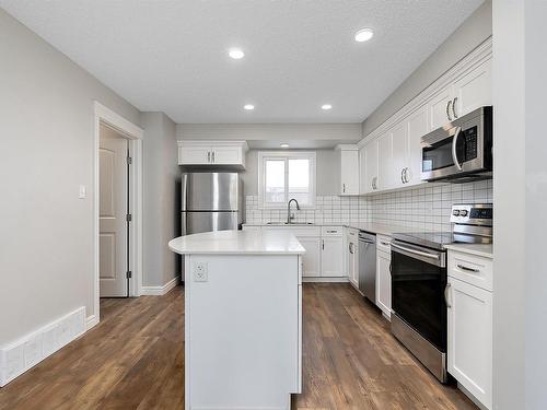 206 Allard Way, Fort Saskatchewan, AB - Indoor Photo Showing Kitchen With Stainless Steel Kitchen With Upgraded Kitchen