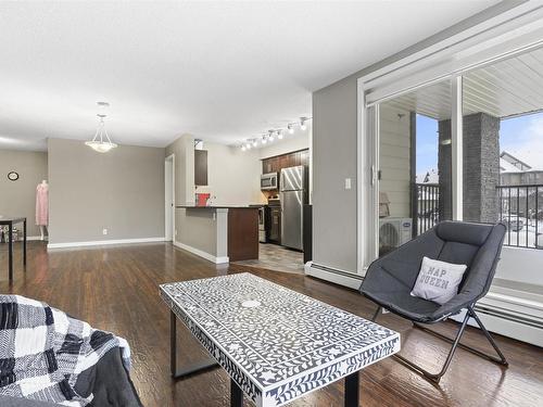 125 5816 Mullen Place, Edmonton, AB - Indoor Photo Showing Living Room