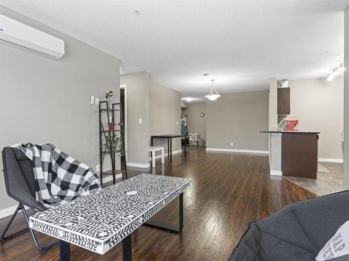 125 5816 Mullen Place, Edmonton, AB - Indoor Photo Showing Living Room