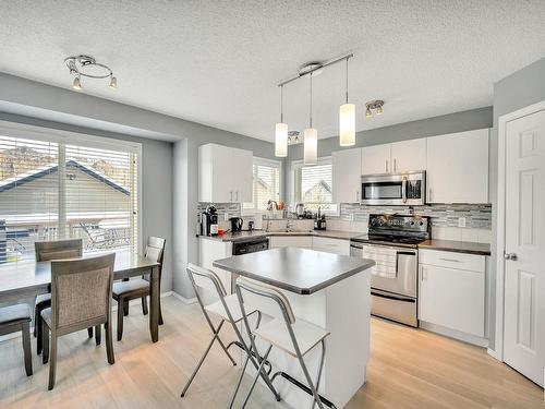 5831 Sutter Place, Edmonton, AB - Indoor Photo Showing Kitchen With Upgraded Kitchen