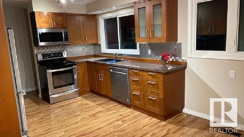 8408 145 Avenue Nw, Edmonton, AB - Indoor Photo Showing Kitchen With Double Sink