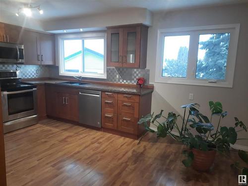 8408 145 Avenue Nw, Edmonton, AB - Indoor Photo Showing Kitchen With Stainless Steel Kitchen With Double Sink