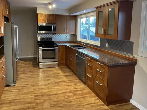 8408 145 Avenue Nw, Edmonton, AB - Indoor Photo Showing Kitchen With Stainless Steel Kitchen With Double Sink