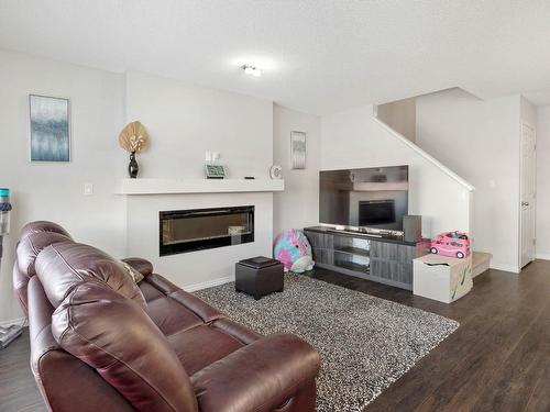 2076 Price Landing, Edmonton, AB - Indoor Photo Showing Living Room With Fireplace