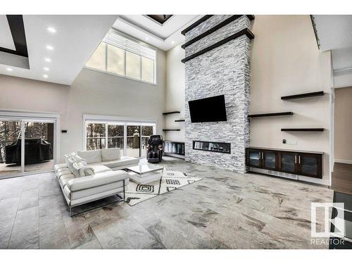 1 52225 Range Rd 232, Rural Strathcona County, AB - Indoor Photo Showing Living Room With Fireplace