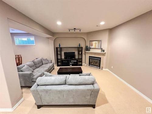 1 1251 Rutherford Road, Edmonton, AB - Indoor Photo Showing Other Room With Fireplace