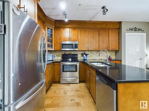 619 10235 112 Street, Edmonton, AB - Indoor Photo Showing Kitchen With Stainless Steel Kitchen With Double Sink