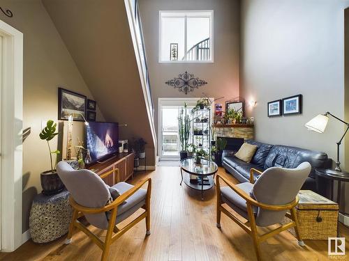 619 10235 112 Street, Edmonton, AB - Indoor Photo Showing Other Room With Fireplace