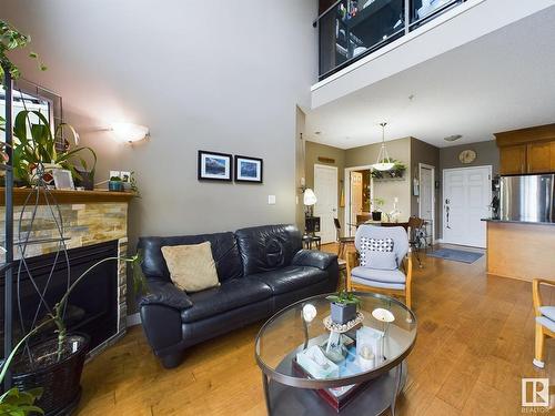 619 10235 112 Street, Edmonton, AB - Indoor Photo Showing Living Room With Fireplace