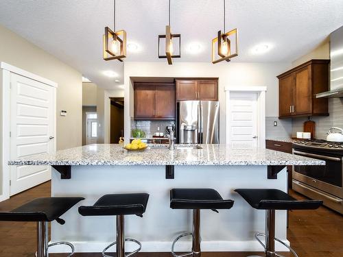 93 Sheppard Way, Leduc, AB - Indoor Photo Showing Kitchen With Stainless Steel Kitchen With Upgraded Kitchen