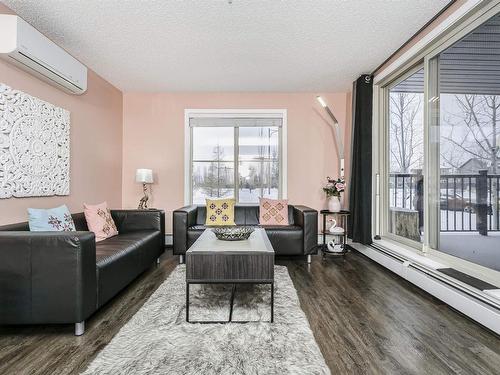 118 12045 22 Avenue, Edmonton, AB - Indoor Photo Showing Living Room