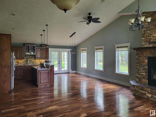 630049 Range Road 55, Rural Woodlands County, AB - Indoor Photo Showing Other Room With Fireplace