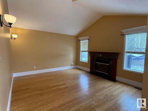 527 89 Street, Edmonton, AB - Indoor Photo Showing Living Room With Fireplace