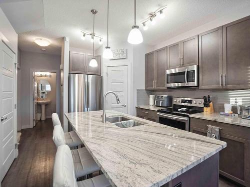 7173 Cardinal Way, Edmonton, AB - Indoor Photo Showing Kitchen With Double Sink With Upgraded Kitchen