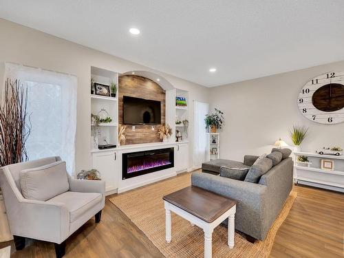 28-52414 Rge Road 30, Rural Parkland County, AB - Indoor Photo Showing Living Room With Fireplace