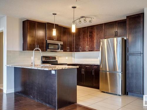 414 5151 Windermere Boulevard, Edmonton, AB - Indoor Photo Showing Kitchen With Stainless Steel Kitchen With Upgraded Kitchen