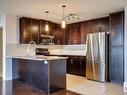 414 5151 Windermere Boulevard, Edmonton, AB  - Indoor Photo Showing Kitchen With Stainless Steel Kitchen With Upgraded Kitchen 