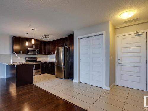 414 5151 Windermere Boulevard, Edmonton, AB - Indoor Photo Showing Kitchen With Stainless Steel Kitchen