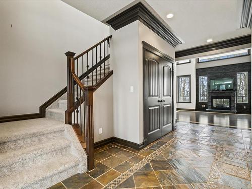 1086 Genesis Lake Boulevard, Stony Plain, AB - Indoor Photo Showing Other Room With Fireplace