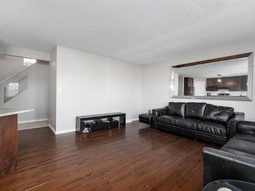 8732 10 Avenue, Edmonton, AB - Indoor Photo Showing Living Room