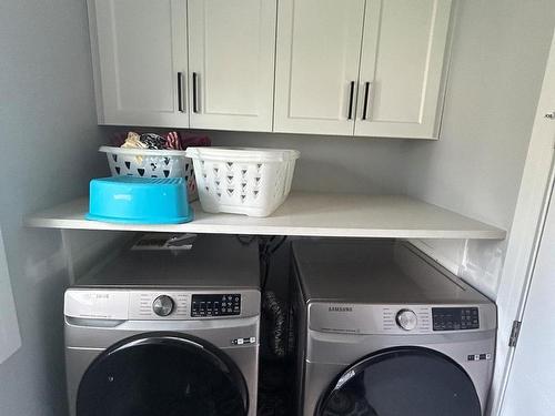 60 Riverstone Close, Rural Sturgeon County, AB - Indoor Photo Showing Laundry Room