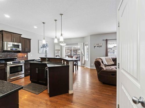 79 Avonlea Way, Spruce Grove, AB - Indoor Photo Showing Kitchen With Upgraded Kitchen