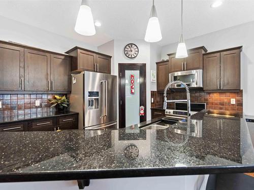 79 Avonlea Way, Spruce Grove, AB - Indoor Photo Showing Kitchen With Upgraded Kitchen