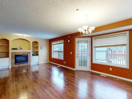 3553 23 St, Edmonton, AB - Indoor With Fireplace