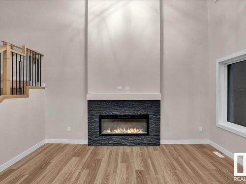 2029 209A Street, Edmonton, AB - Indoor Photo Showing Living Room With Fireplace