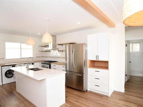 9604/9606 124 Avenue, Edmonton, AB - Indoor Photo Showing Kitchen With Double Sink