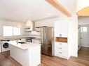 9604/9606 124 Avenue, Edmonton, AB  - Indoor Photo Showing Kitchen With Double Sink 