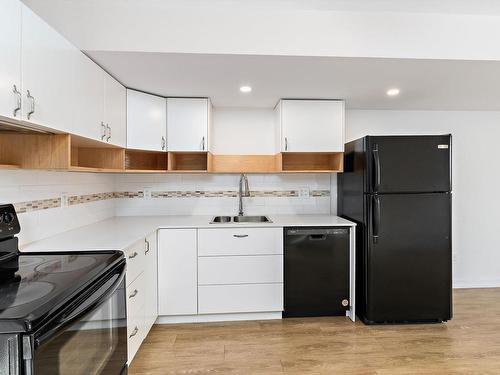 9604/9606 124 Avenue, Edmonton, AB - Indoor Photo Showing Kitchen With Double Sink