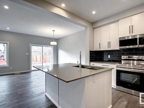 23 Prospect Place, Spruce Grove, AB - Indoor Photo Showing Kitchen With Double Sink