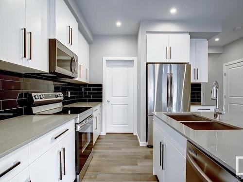 23 Prospect Place, Spruce Grove, AB - Indoor Photo Showing Kitchen With Stainless Steel Kitchen With Double Sink With Upgraded Kitchen