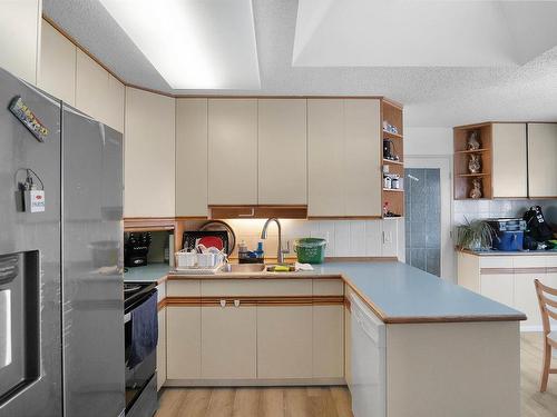 8504 138 Avenue, Edmonton, AB - Indoor Photo Showing Kitchen With Double Sink