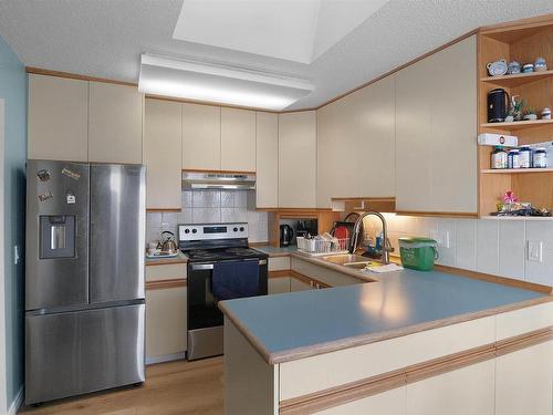 8504 138 Avenue, Edmonton, AB - Indoor Photo Showing Kitchen With Double Sink