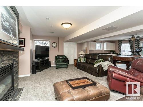 19 Frederick Boulevard, Rural Parkland County, AB - Indoor Photo Showing Living Room With Fireplace