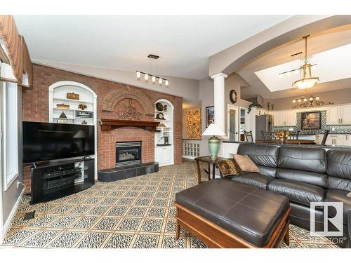 19 Frederick Boulevard, Rural Parkland County, AB - Indoor Photo Showing Living Room With Fireplace