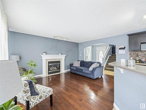 1151 Rutherford Close, Edmonton, AB - Indoor Photo Showing Living Room With Fireplace