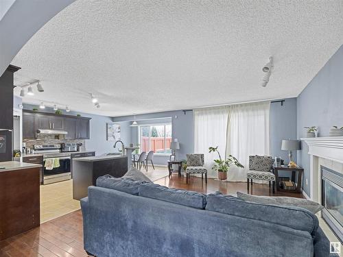 1151 Rutherford Close, Edmonton, AB - Indoor Photo Showing Living Room With Fireplace