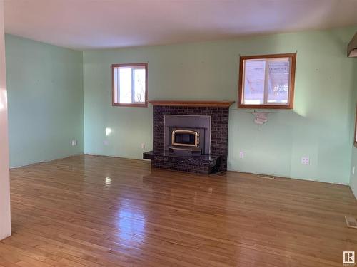 53250 Rge Road 212, Rural Strathcona County, AB - Indoor Photo Showing Living Room With Fireplace