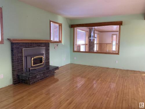 53250 Rge Road 212, Rural Strathcona County, AB - Indoor Photo Showing Living Room With Fireplace