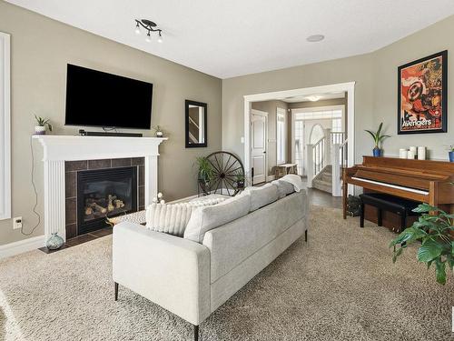 3908 164 Avenue, Edmonton, AB - Indoor Photo Showing Living Room With Fireplace