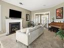 3908 164 Avenue, Edmonton, AB  - Indoor Photo Showing Living Room With Fireplace 