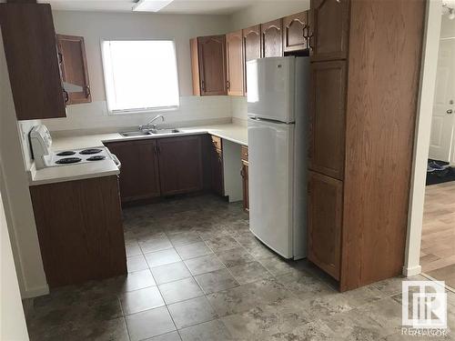 12717 67 Street, Edmonton, AB - Indoor Photo Showing Kitchen With Double Sink