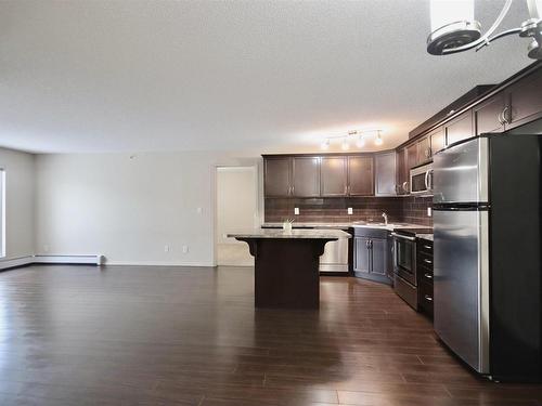 407 6070 Schonsee Way, Edmonton, AB - Indoor Photo Showing Kitchen With Stainless Steel Kitchen