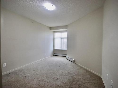 407 6070 Schonsee Way, Edmonton, AB - Indoor Photo Showing Other Room